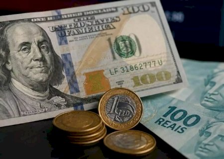 D&oacute;lar fecha em queda a R$ 5,10 ap&oacute;s taxa de juros cair para 14%>